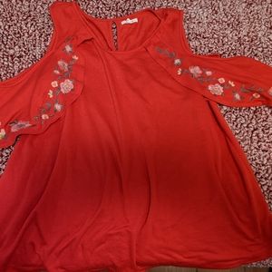 Red cut out sleeve shirt with flowy sleeves